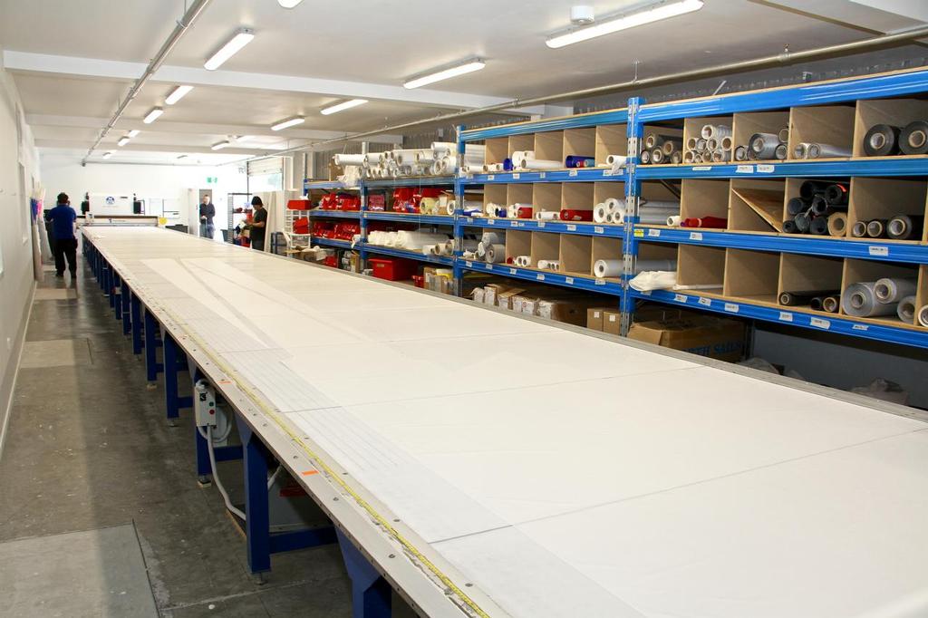 Panel cutting table has its entry at the far end and cut panels stored at the right - North Sails NZ Loft - July 20, 2016 © Richard Gladwell www.photosport.co.nz